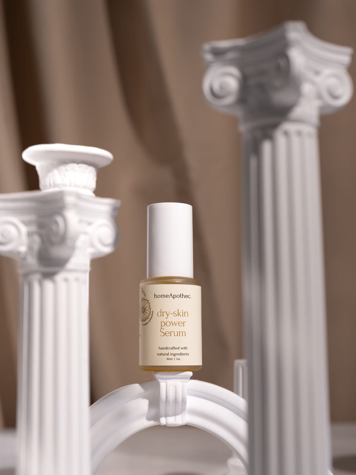 Dry Skin Power Serum 30ml bottle on a white column